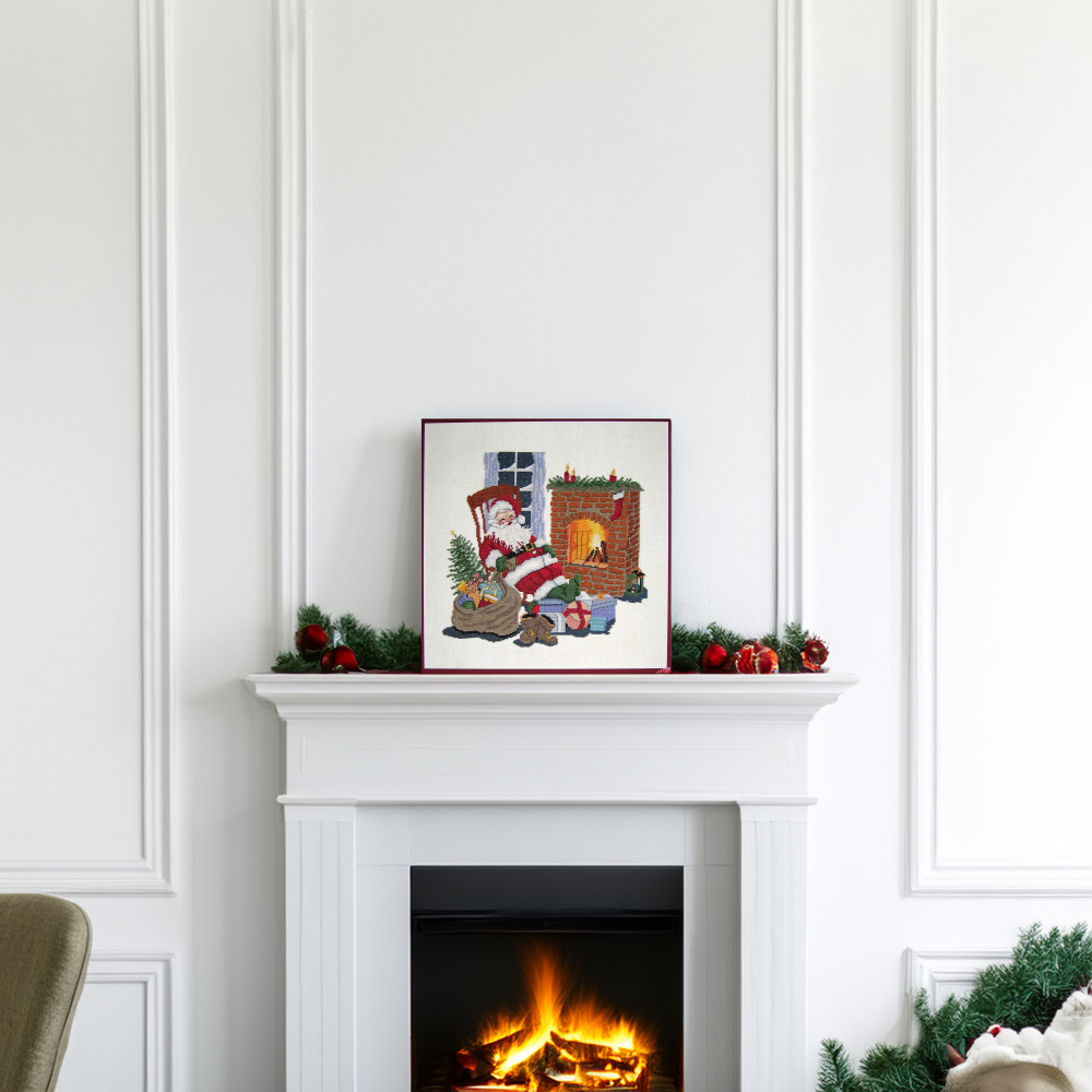 Father Christmas by the fire